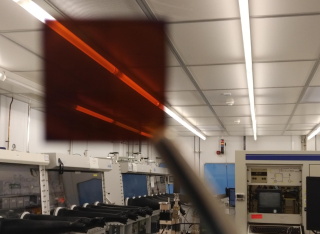 solar cell held up in lab
