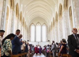 A photo from inside Guildford Cathedral during a graduation ceremony