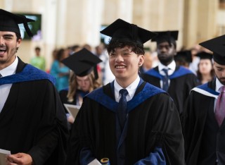 Students inside the Cathedral at a graduation ceremony