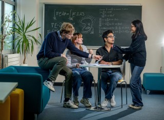 Maths students gathered in classroom
