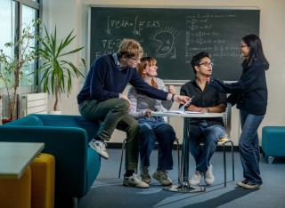 Maths students gathered in classroom