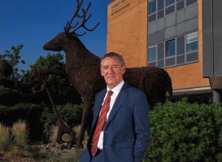A photo of Lord Jim O'Neill on Stag Hill Campus