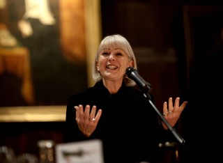 Judith speaking at an event