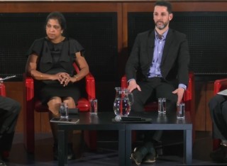 Panel of four people seated at Royal Geographical Society event about ‘green’ travel on 3 March 2026