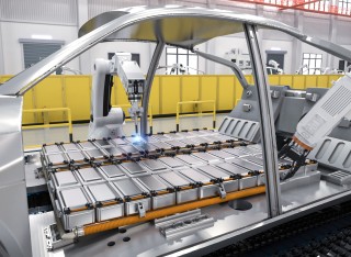 The shell of an electric vehicle on a manufacturing line 