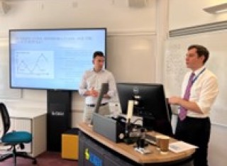 Two representatives from Barclays Wealth Management at a guest lecture for Surrey Business School students
