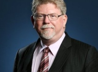 A photograph of Dr David Ebsworth