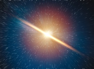 A star mid explosion with a line of white light through it