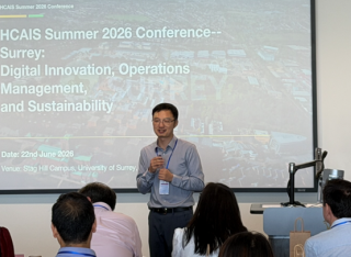 Senmao Xia giving opening address at Human-Centred AI Society (HCAIS) Summer 2026 conference at the University of Surrey