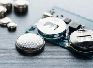 Close up of button cell battery