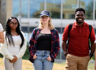 Students smiling at camera