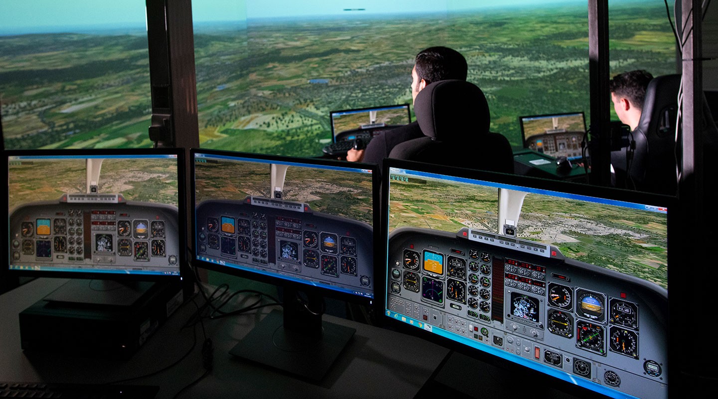 Aerospace student using flight simulator