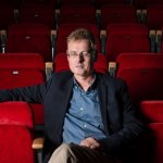 Robert Shaughnessy sitting in a theatre