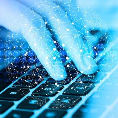 Hand typing on a keyboard