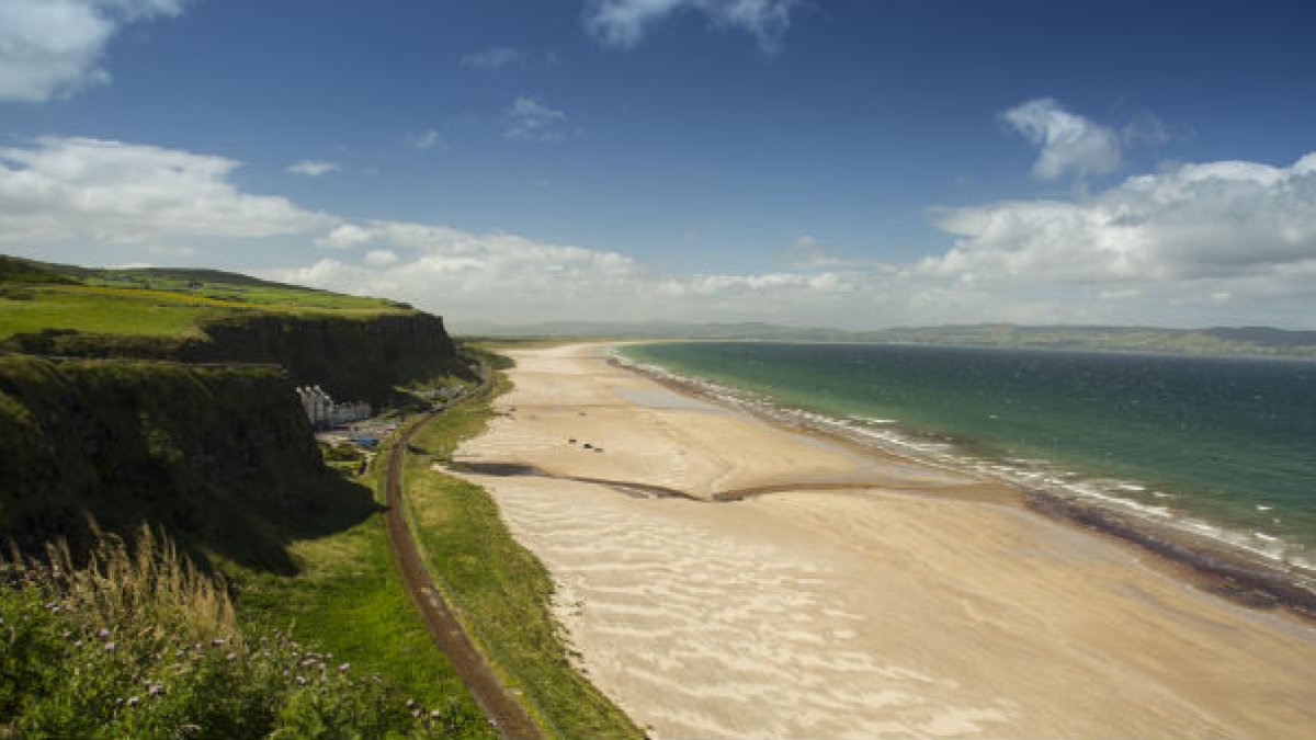 Aerial view of the coastline with beach and sea