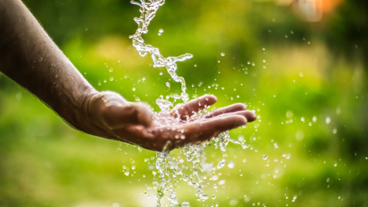 Water falling on a hand