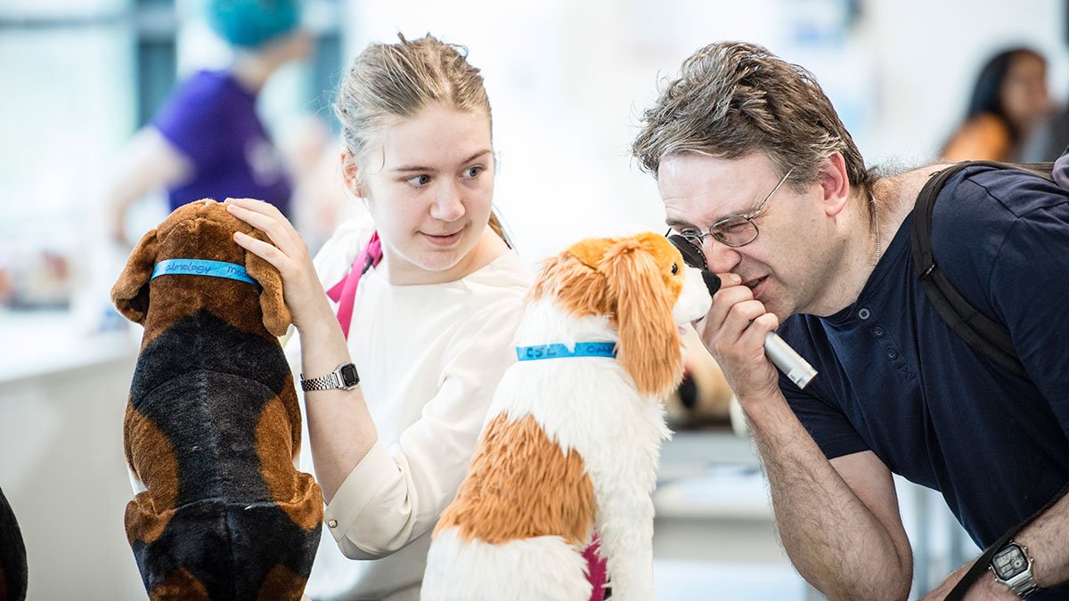 A student and partent using equipment at the vet school