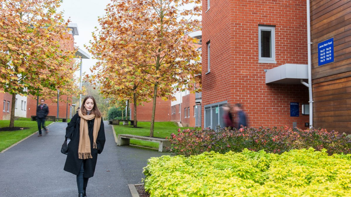 Student walking through Manor Park