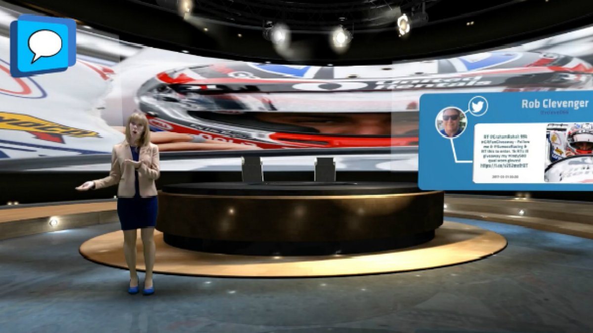Woman standing in front of interactive screen