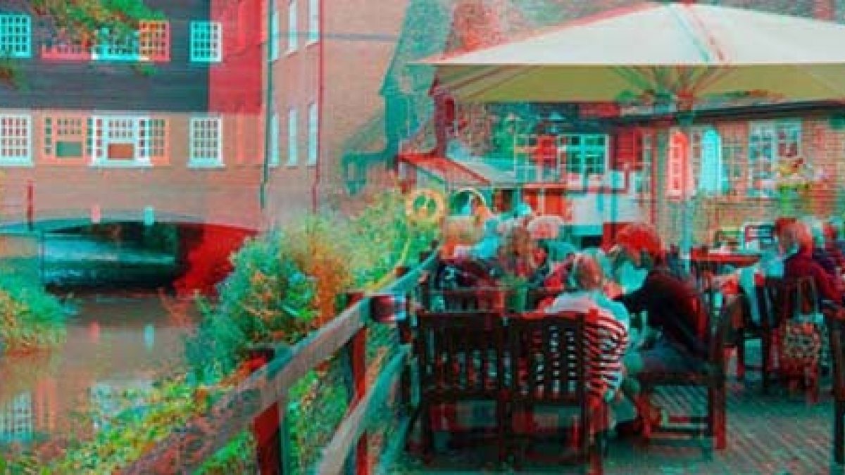 People sitting on picnic benches