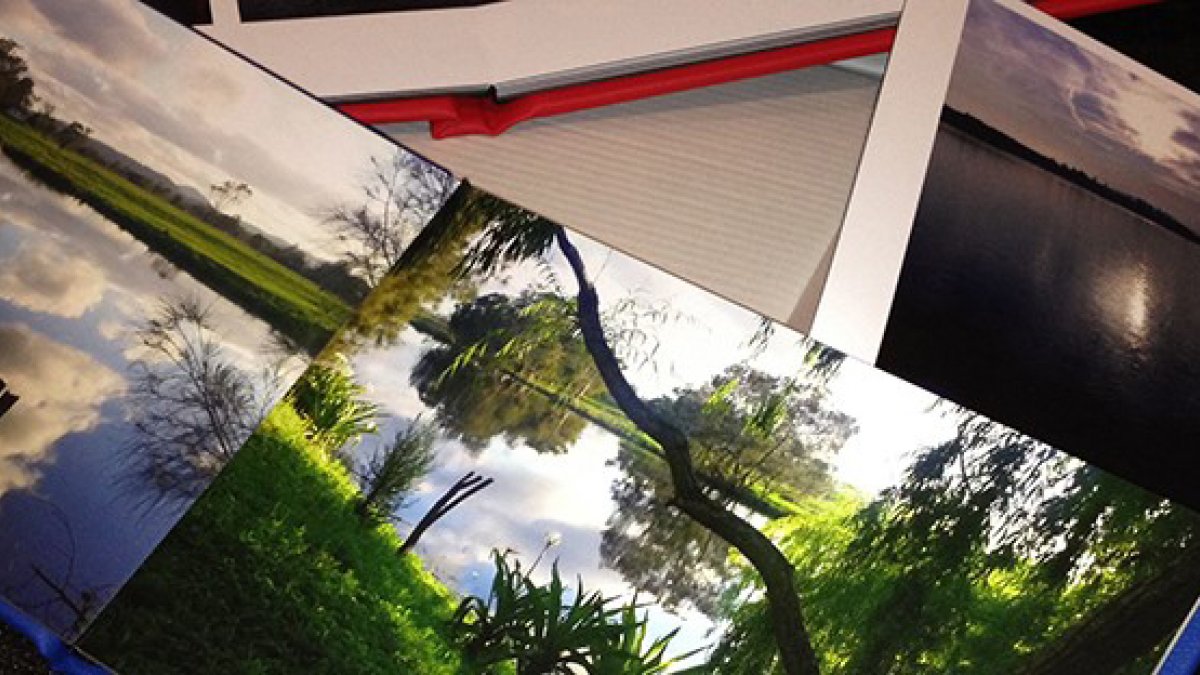 Pictures and papers on a black background