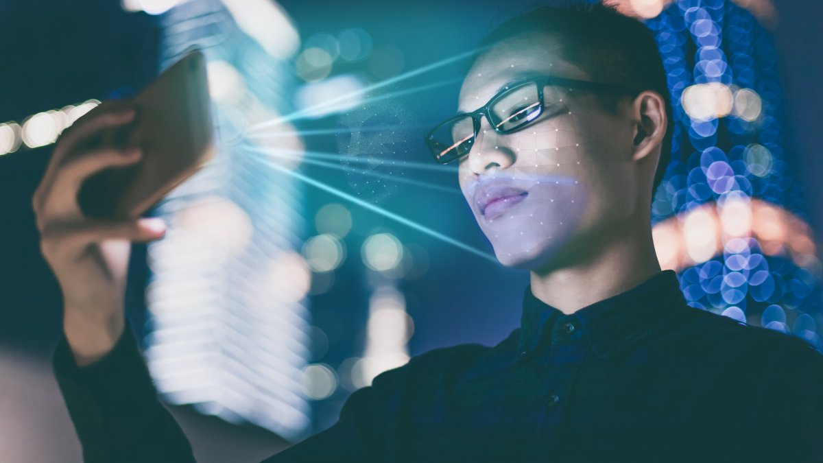 Person using facial recognition technology