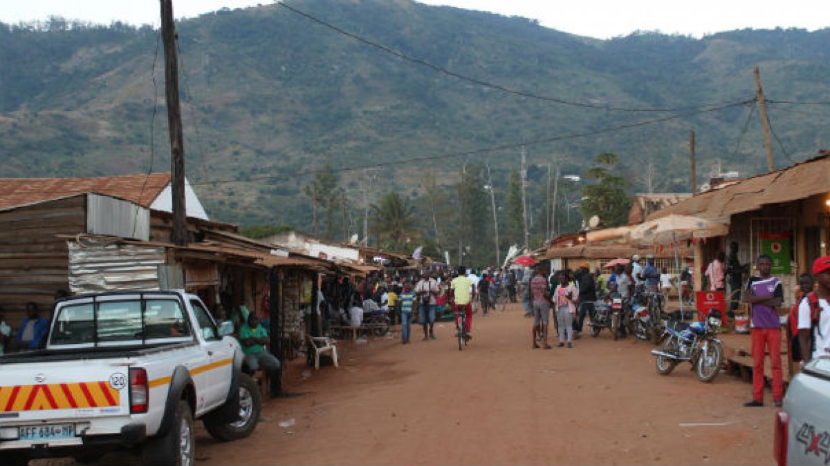 Street of people and cars in third world country