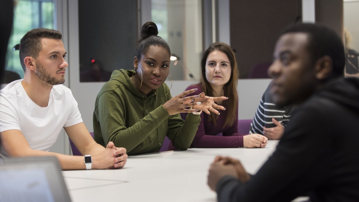 Group of people in a class having a discussion