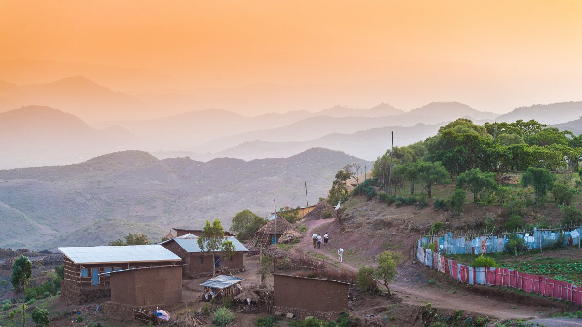 Sunset over hills in Uganda countryside