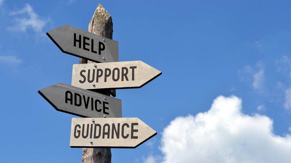 Sign post with the words help, support, advice and guidance listed