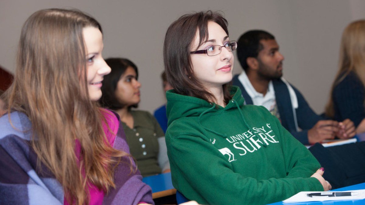 Two students listening to talk