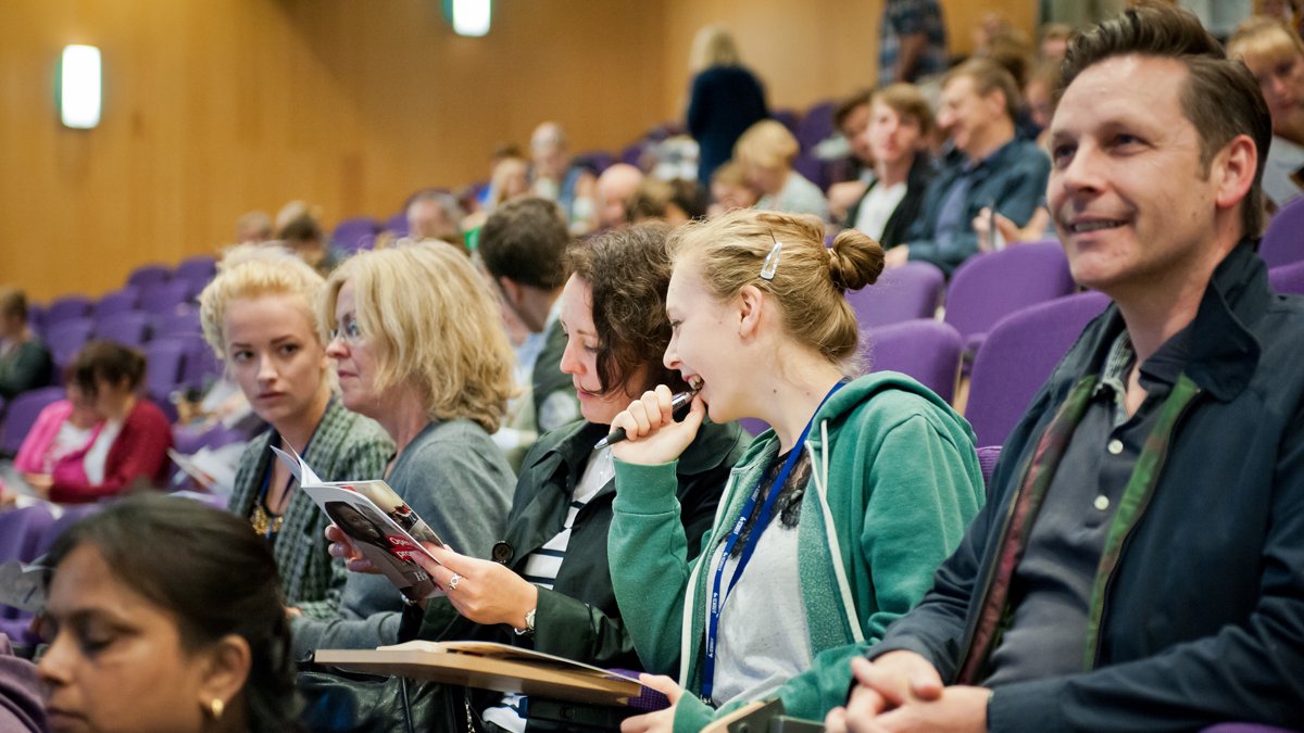 People sat in lecture theatre listening to open days talk