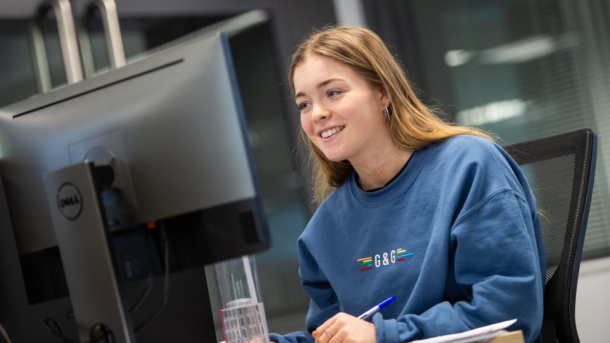 A person using a computer in the new psychology facilities at Surrey