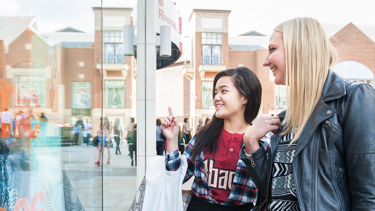 Student shopping in Guildford