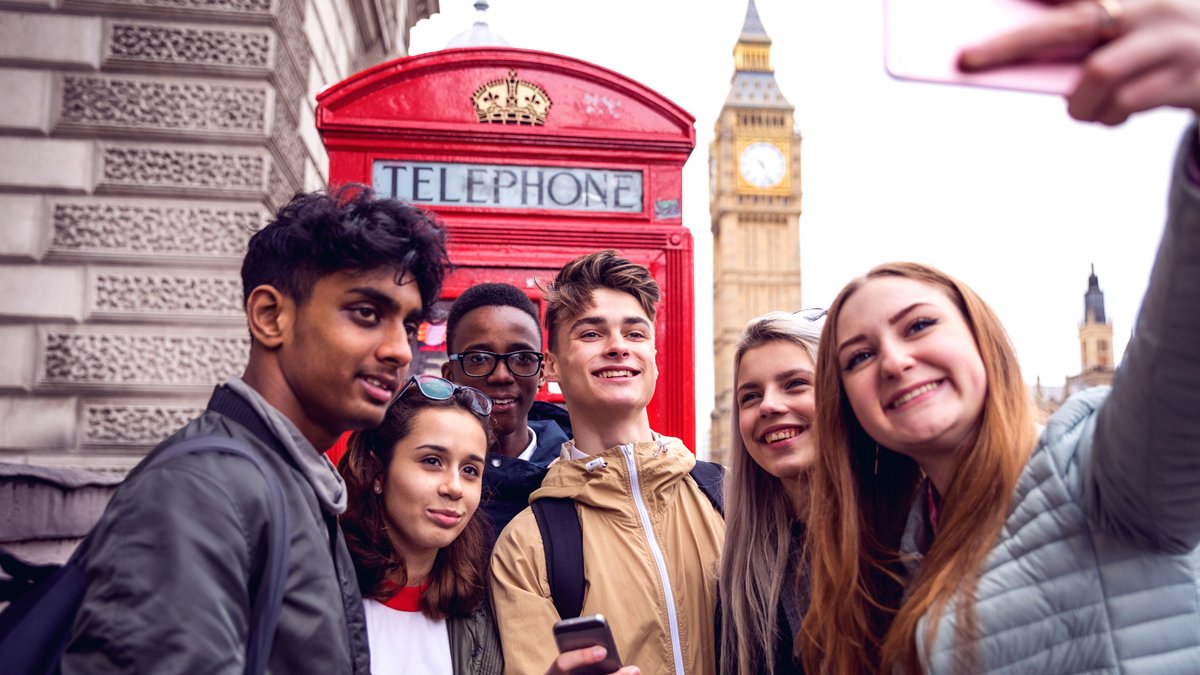 Students taking selfie in London
