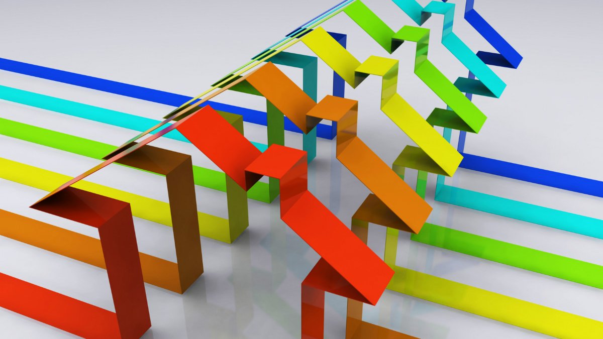 Coloured houses representing LGBTQ+ housing