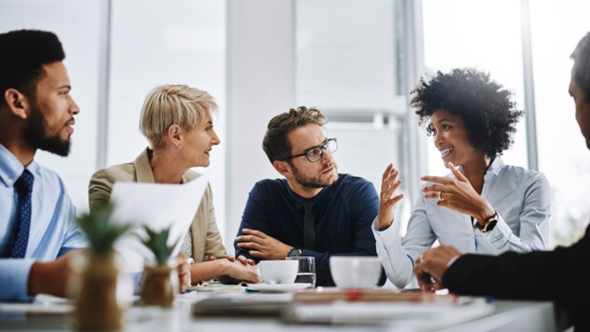 People talking at a table