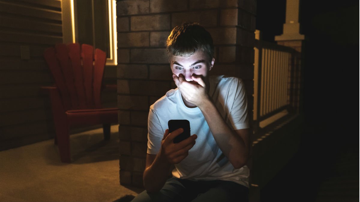 A young man sexting