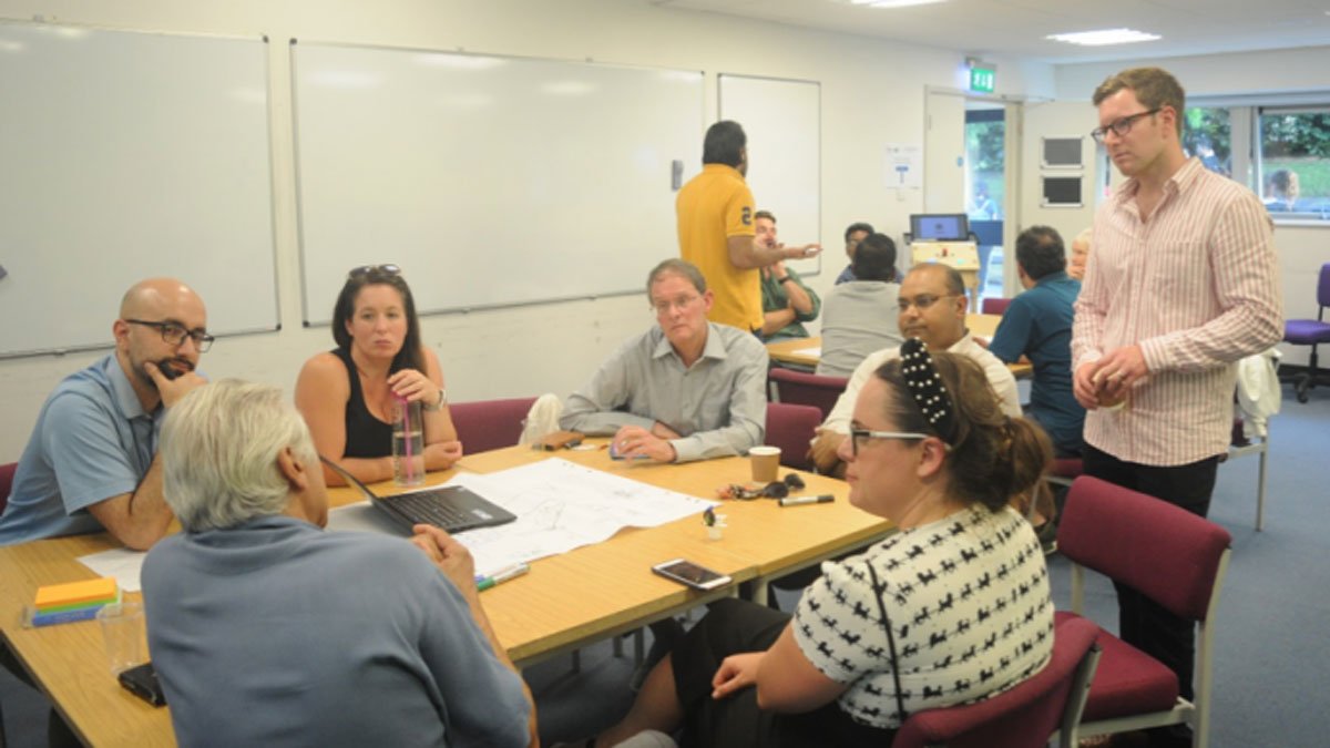 iSCAPE team talking together