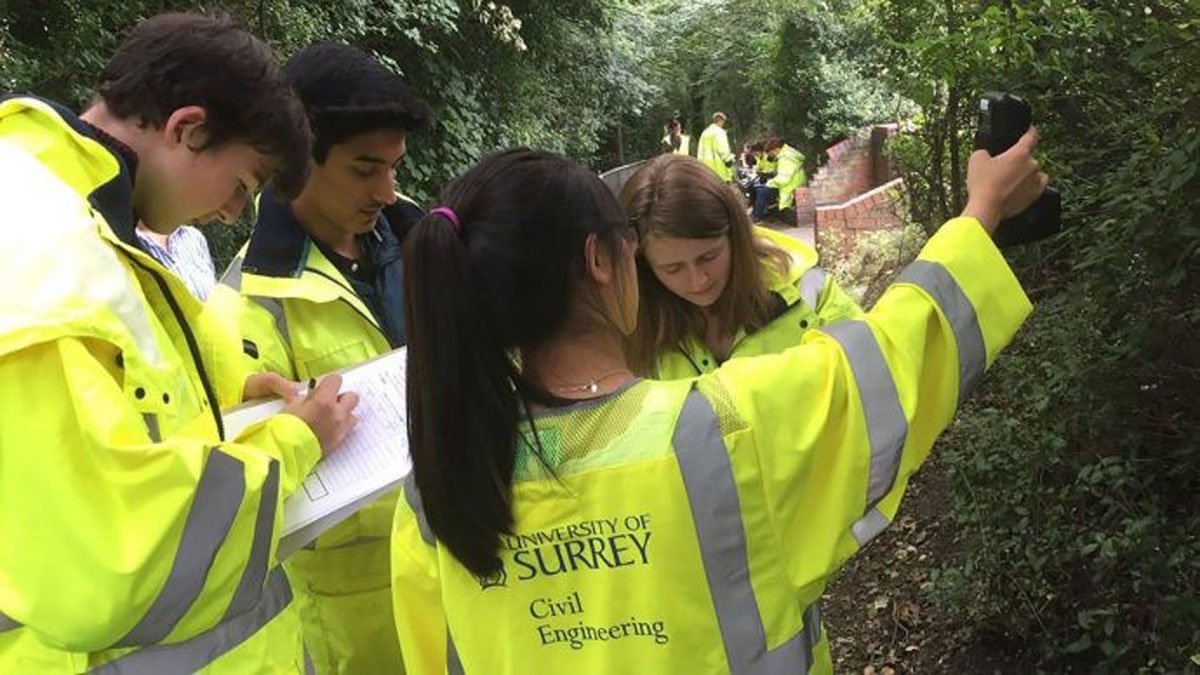 Summer school students using GCARE equipment