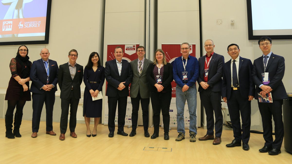 Group of people standing in a row