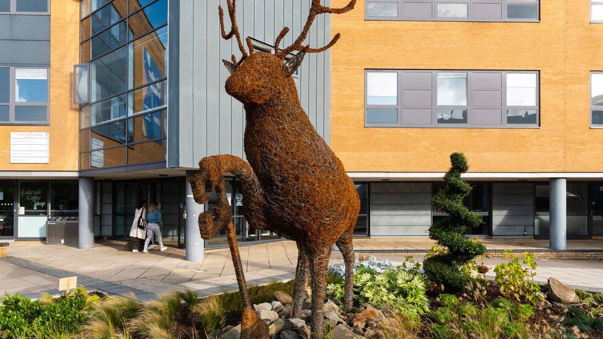 Stag sculpture outside building