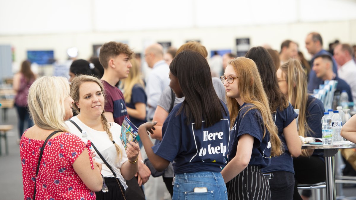 group of students and parents at the open day