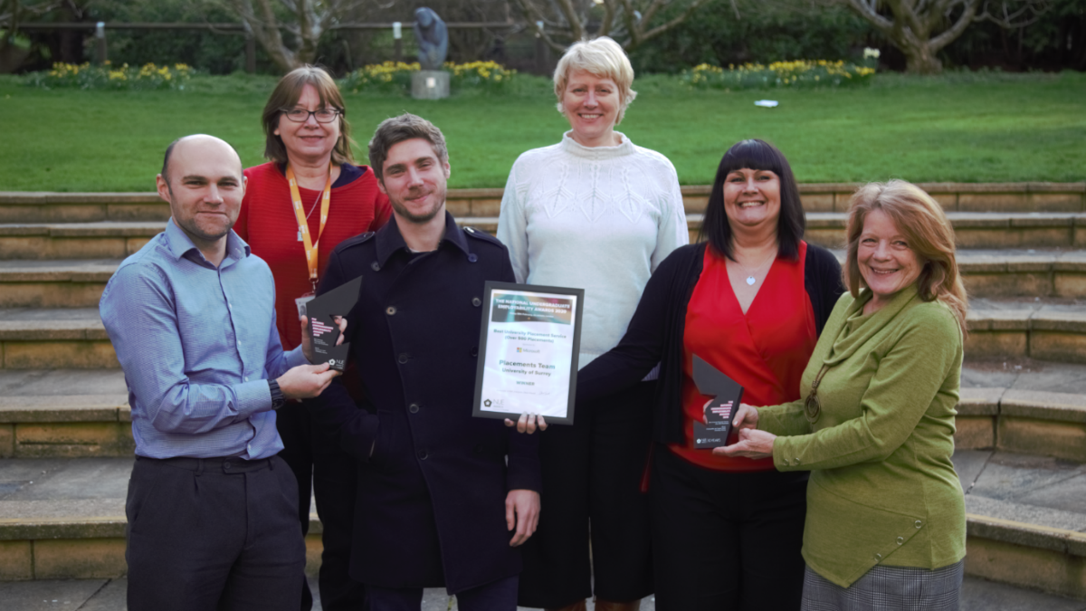 The University of Surrey Placement Team pose with their 2019 and 2020 awards