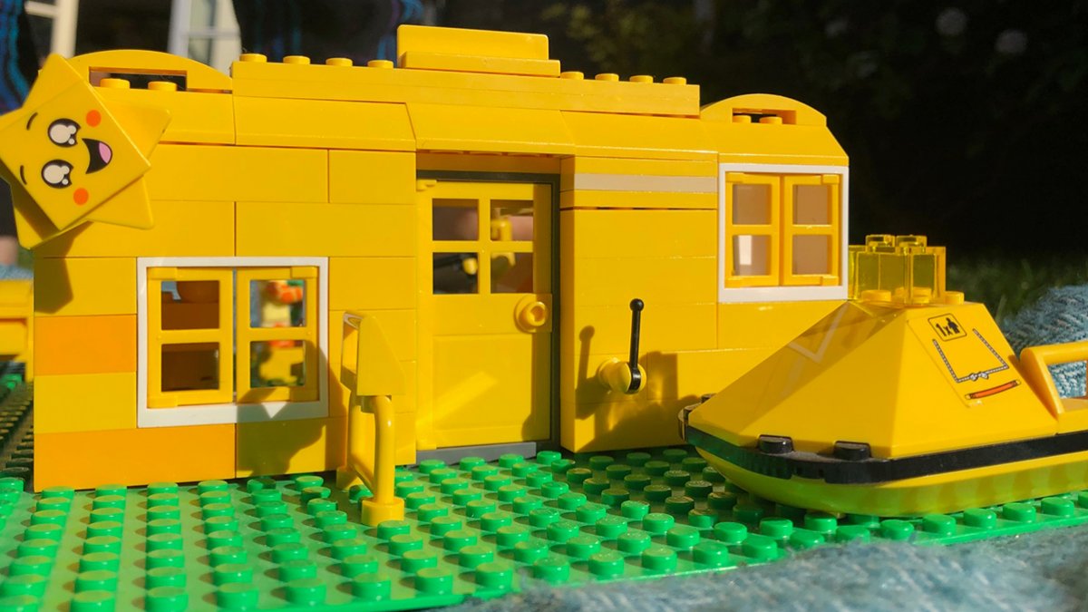 A yellow LEGO house