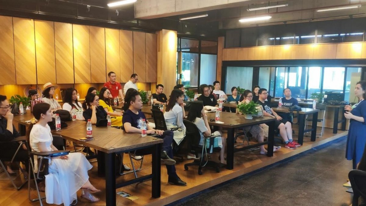 Photograph of all guests listening to speaker Adina Deacu