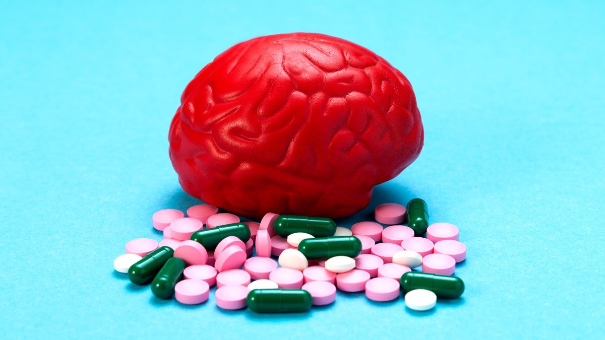 Red brain structure on top of pills