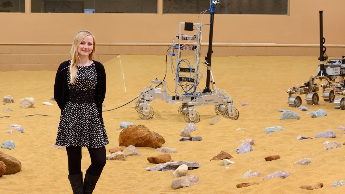 Abbie with a prototype rover, nicknamed 'Bryan'!