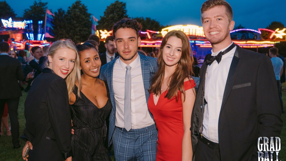 A group of graduates celebrating at Graduation Ball