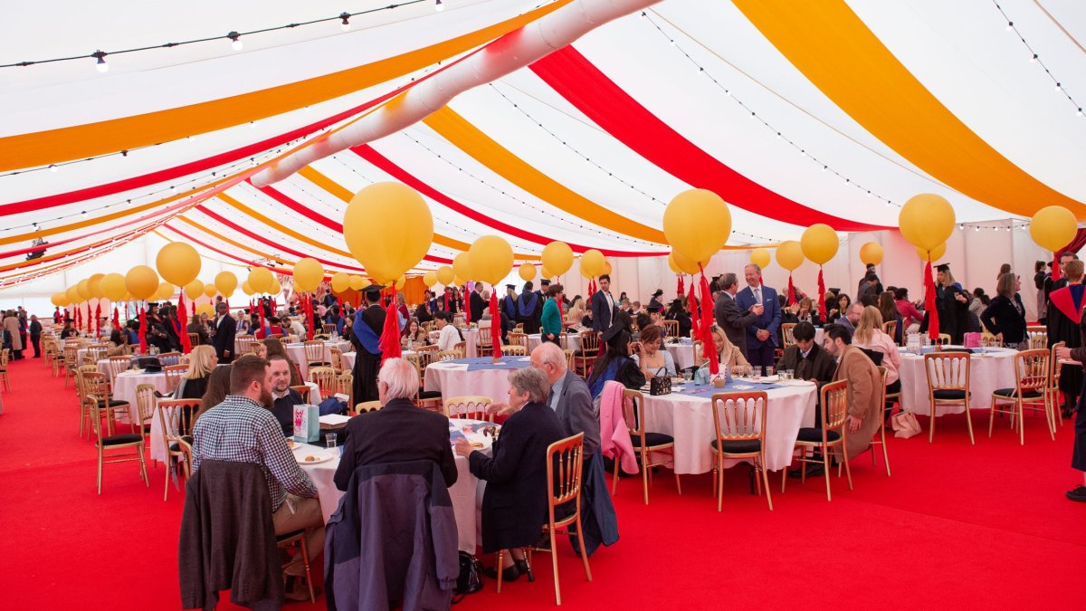 A wide photo of the graduation celebratory reception venue